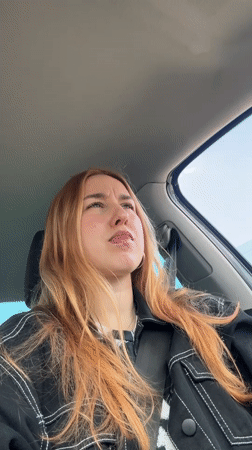 Woman in denim jacket observed driving in Minsk