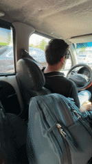 Travelers with luggage observed in car in Tashkent