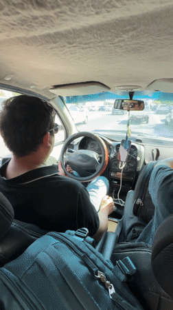 Travelers with luggage observed in car in Tashkent