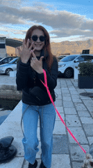 Couple celebrates engagement at Budva harbor with ring ceremony