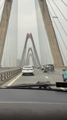 Morning traffic crosses cable-stayed bridge in Hanoi