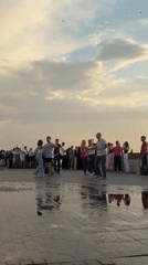 Sunset dancing on the Volga embankment in Astrakhan