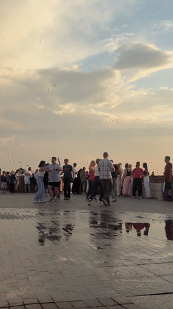 Sunset dancing on the Volga embankment in Astrakhan