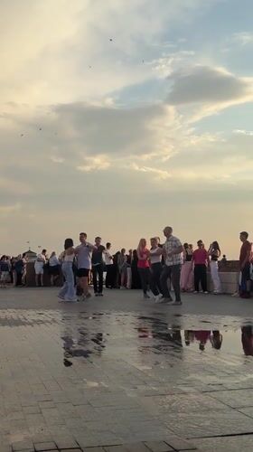 Sunset dancing on the Volga embankment in Astrakhan