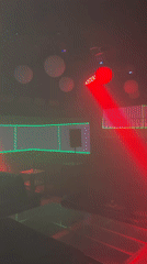 Inside and outside a lit-up Nigerian nightlife venue at night.