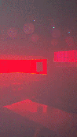 Inside and outside a lit-up Nigerian nightlife venue at night.