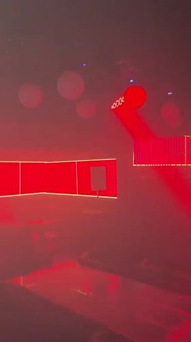 Inside and outside a lit-up Nigerian nightlife venue at night.