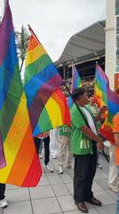 Pride parade rolls through Baan Chaweng with costumes and rainbow flags