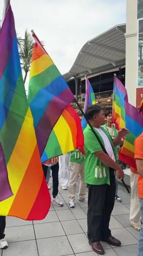 Pride parade rolls through Baan Chaweng with costumes and rainbow flags