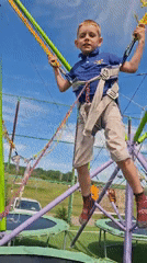 Child plays on trampoline equipment in Kokshetau, Kazakhstan