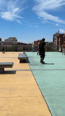 Skateboarder practices tricks at l'Hospitalet de Llobregat park