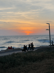 Sunset draws beachgoers to Tel Aviv's Mediterranean coastline