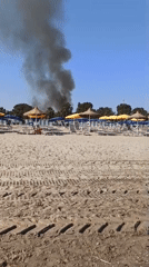 Fire sends smoke over busy Barletta beach on summer morning