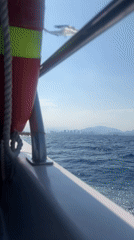 Boat passenger records ocean view near Nha Trang coastline