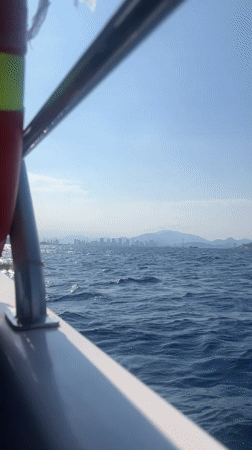 Boat passenger records ocean view near Nha Trang coastline