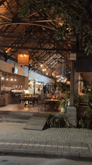 Nighttime restaurant scene with live music captured in Ubud