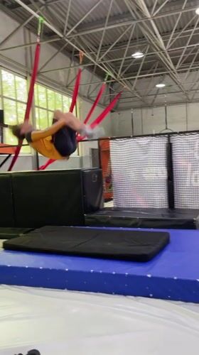 Young man practices gymnastics at Krasnoyarsk fitness facility