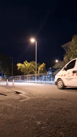 Late-night activity outside a Banda Aceh hospital emergency entrance