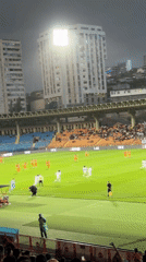 Soccer match played in rainy Yerevan stadium