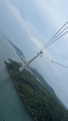 Cable car passenger films aerial view of Phú Quốc coastline