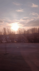 Spring sunset captured over snowy Russian countryside near Kamaevo