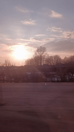 Spring sunset captured over snowy Russian countryside near Kamaevo