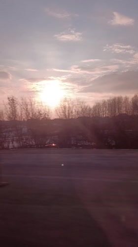 Spring sunset captured over snowy Russian countryside near Kamaevo