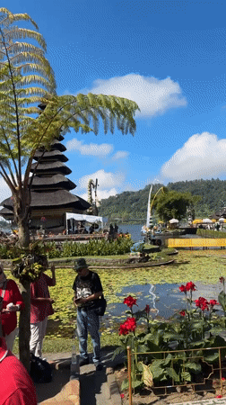 Tourists and ceremonies documented at Balinese water temple