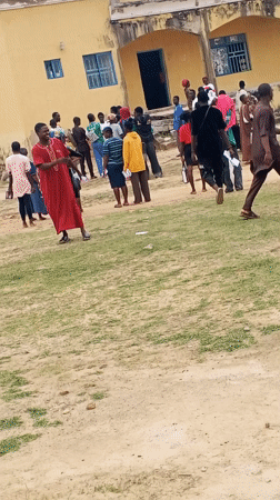 Community gathering at electrification project site in Akwanga