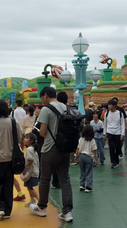 Visitors explore Super Nintendo World attractions in Osaka theme park