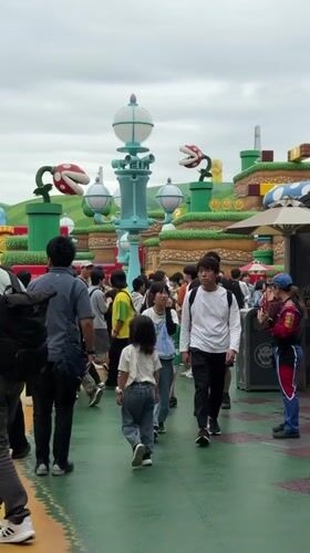 Visitors explore Super Nintendo World attractions in Osaka theme park