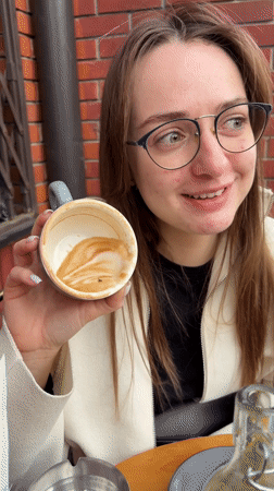 Dachshund naps in chair at Serbian cafe