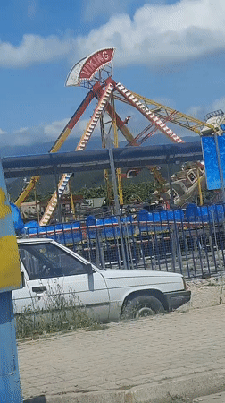 Viking amusement ride operates with passengers in Kumluca, Turkey