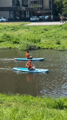 Paddleboarding and park life along a Saint Petersburg waterway