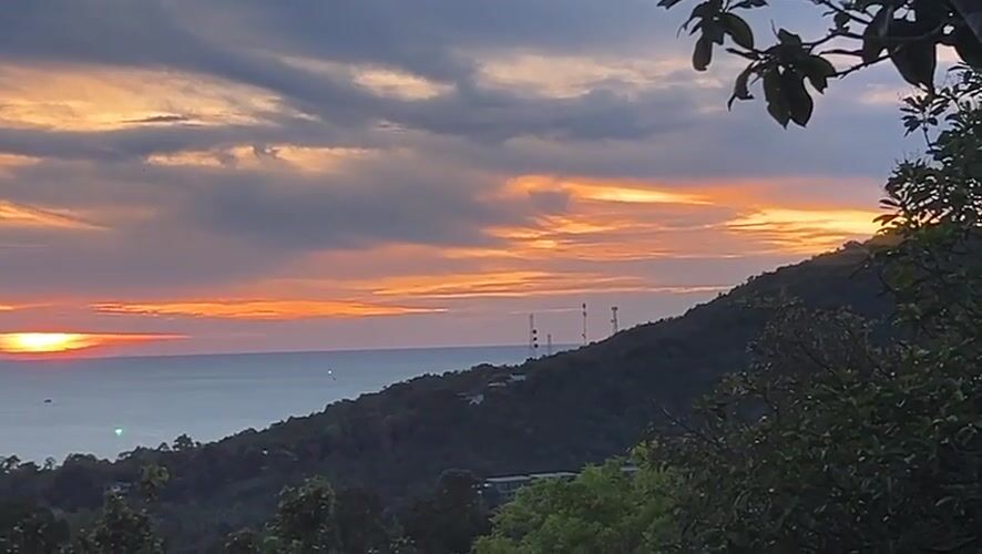 Sunset documented over ocean in Baan Hin Kong Thailand