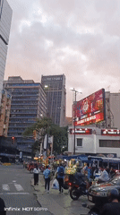 Street performers entertain diners in busy Caracas commercial district