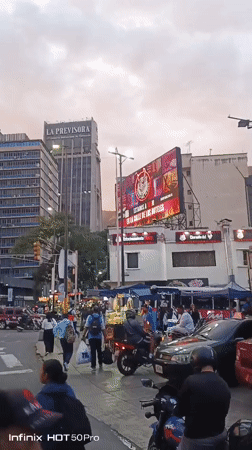 Street performers entertain diners in busy Caracas commercial district