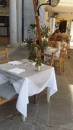 Restaurant outdoor dining area documented in Livorno, Italy