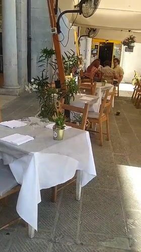 Restaurant outdoor dining area documented in Livorno, Italy