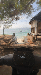 Electric scooter ride along a Lombok beach road