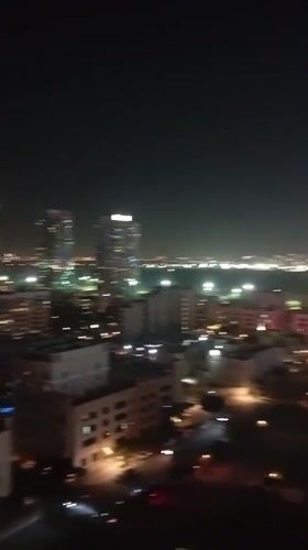 Dubai resident documents art collection and nighttime skyline views