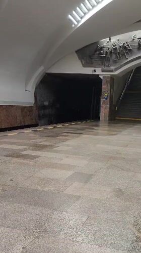 Blue subway train 8921 arrives at Yekaterinburg metro station