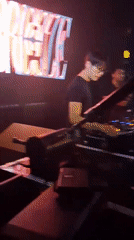 DJ performs at BREZE venue with Pioneer mixing console