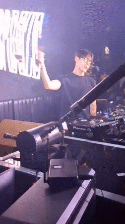 DJ performs at BREZE venue with Pioneer mixing console