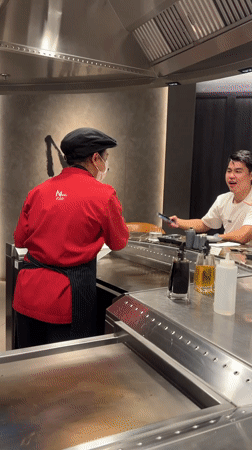 Teppanyaki dining experience captured at Japanese restaurant in Bangkok