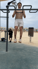 Man exercises at Tel Aviv beachside workout area