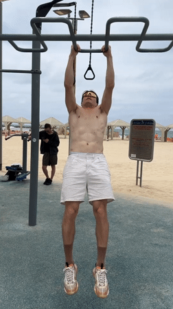 Man exercises at Tel Aviv beachside workout area