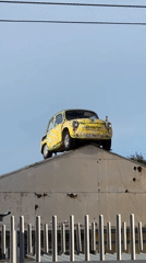 Vintage Fiat Found Perched Atop Building Roof in Bulgaria