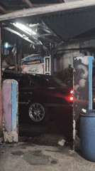 Ordinary moments captured in Depok: car, garage, residents