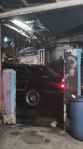 Ordinary moments captured in Depok: car, garage, residents